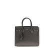 Gray Calf Leather Bos Taurus Shoulder BagThe Sac De Jour Baby leather Handbag by Saint Laurent is an iconic and elegant accessory, crafted from smooth leather and embellished with the brand’s monogram printed on the front. Featuring two round handles, an