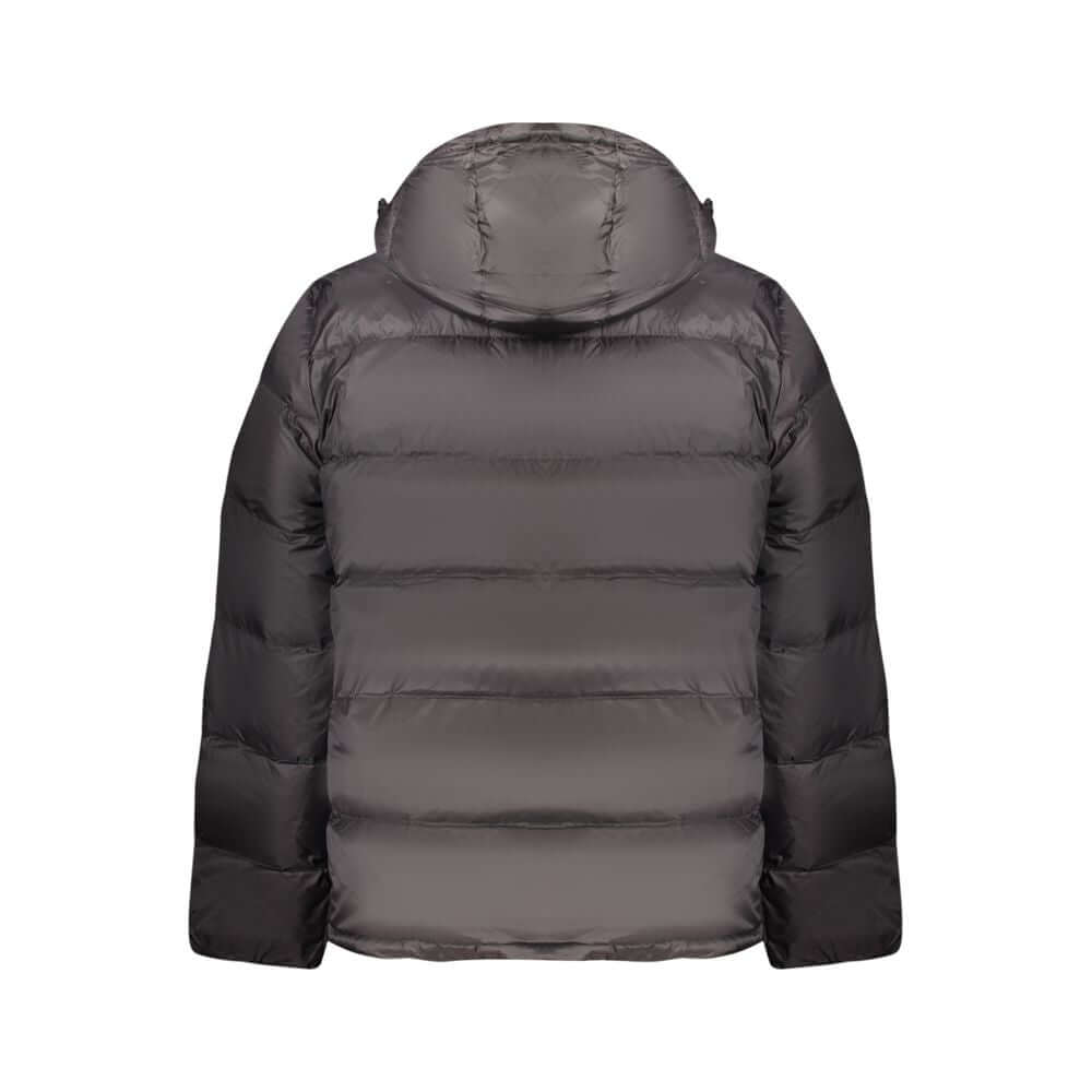 Black Polyamide Men JacketDiscover the epitome of urban sophistication with Calvin Klein’s sleek black jacket, tailor-made for the modern man. This long-sleeved marvel not only boasts a removable hood for versatility but is armed with two external and two