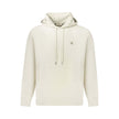Beige Cotton Men SweaterStep into a world of understated sophistication with this Calvin Klein hooded sweatshirt, where comfort meets contemporary style. This chic beige staple is perfect for the fashion-forward individual who appreciates elegance in casu