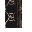 GG ScarfWool Scarf by Gucci features a GG houndstooth jacquard pattern repeated on the front and back, combining the iconic GG monogram with the sophisticated houndstooth motif. Frayed hems add a touch of casual and elegant detail. The scarf measures 47 x