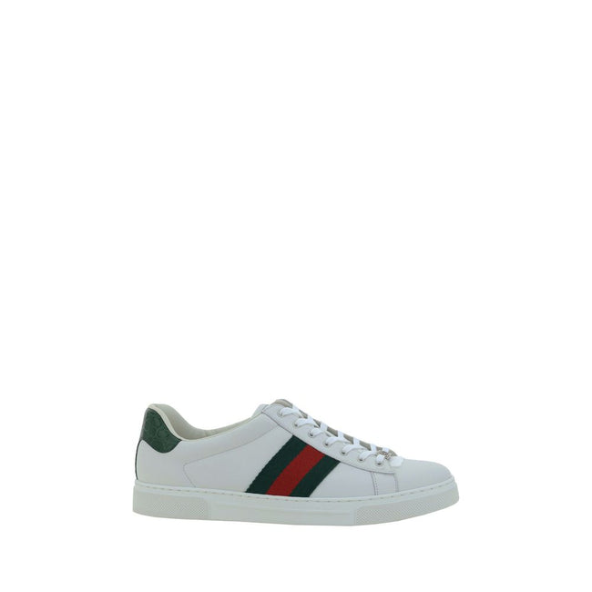 White Calf Leather Bos Taurus Low Top SneakersLeather Sneakers by Gucci feature a front closure via laces for an adjustable and secure fit, with a round toe for comfort. The flat sole offers stability and a modern look. A contrasting logo detail on the ba