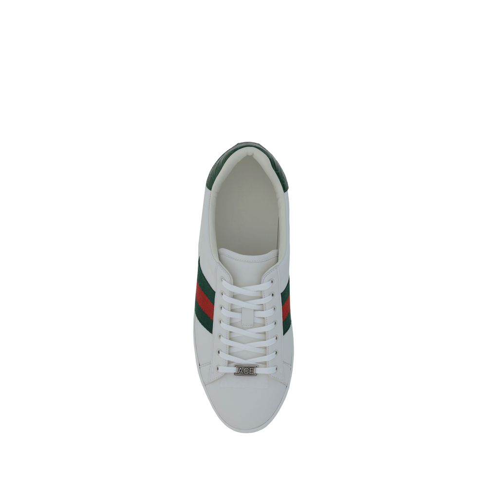 White Calf Leather Bos Taurus Low Top SneakersLeather Sneakers by Gucci feature a front closure via laces for an adjustable and secure fit, with a round toe for comfort. The flat sole offers stability and a modern look. A contrasting logo detail on the ba