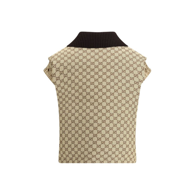 Beige Cotton Jackets And CoatThe Gucci bomber Gilet combines functionality with contemporary character in an essential piece. Sleeveless in design, it features a half zip closure and a single front pocket accented with a leather Gucci logo. Adjustable dra