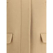 Beige Wool ClothingThe Wool Caban by Gucci reinterprets a timeless outerwear staple with modern and sophisticated details. Its zip closure enhances a hybrid design, where two stitched-in sleeves alternate with two traditionally constructed ones, creating