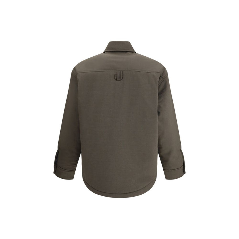 Bicolor Fleece Wool Jackets And CoatThe Boulanger Shirt by Jacquemus blends the elegance of a tailored shirt with the functionality of a padded jacket. Crafted from stretch virgin wool, it features a boxy fit with rounded shoulders, creating a bold, moder