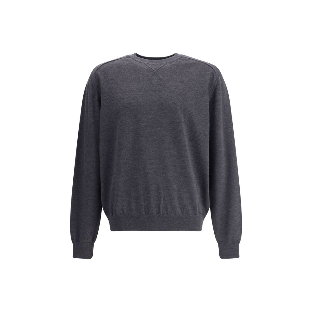 Gray Merino Wool SweatshirtThe crew-neck Sweater by Jacquemus, crafted from off-white merino wool, reflects effortless elegance. Overlock stitching beneath the neckline introduces a contemporary touch, while ribbed edges subtly define the relaxed silhouet