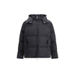 Black Polyester Full-Length JacketThe Off-White Diagonal Arrow Down Jacket blends urban aesthetics with modern functionality. Designed with a quilted, voluminous silhouette, it features long sleeves, a protective turtleneck, and a practical front zip clos