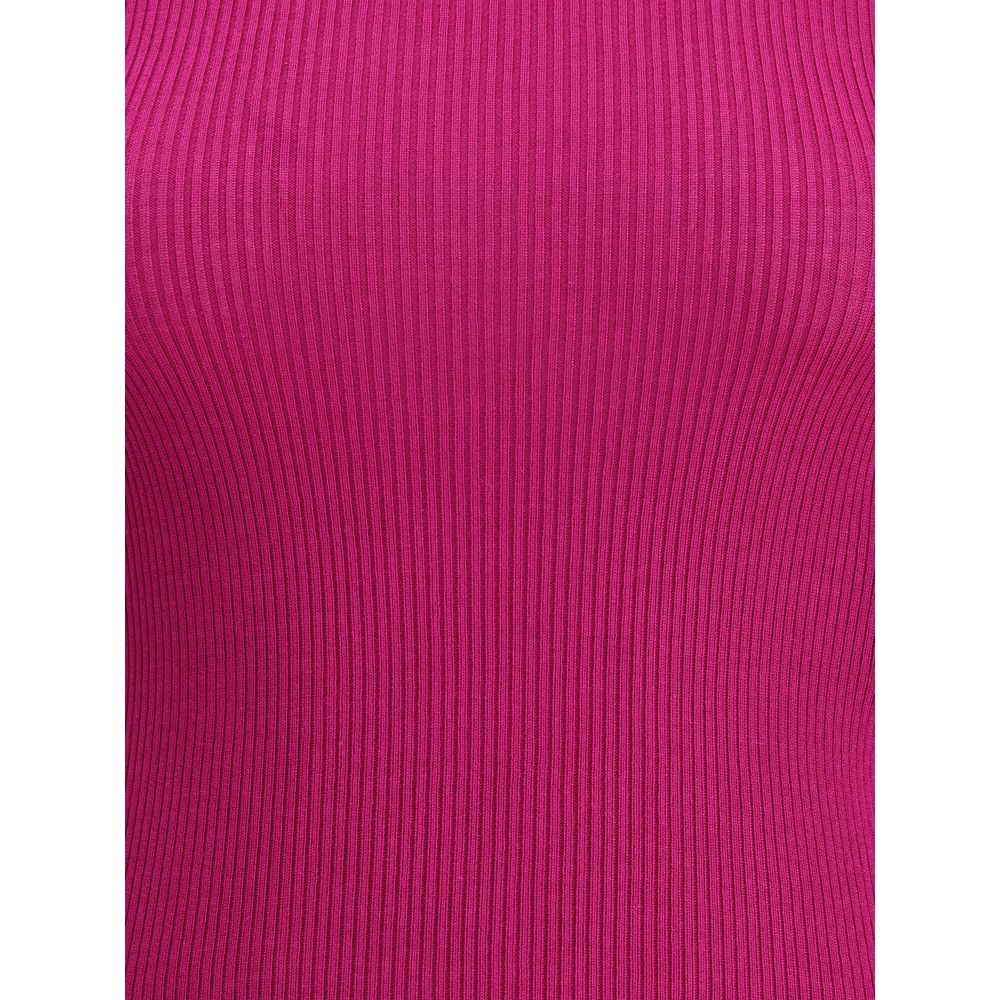 Multicolor Wool TurtleneckThe Yves Saint Laurent Turtleneck Top is an essential piece that enhances the silhouette with its slim fit. Crafted in an all-over ribbed knit, it combines certified cashmere and wool to deliver a soft feel and refined warmth. Ri