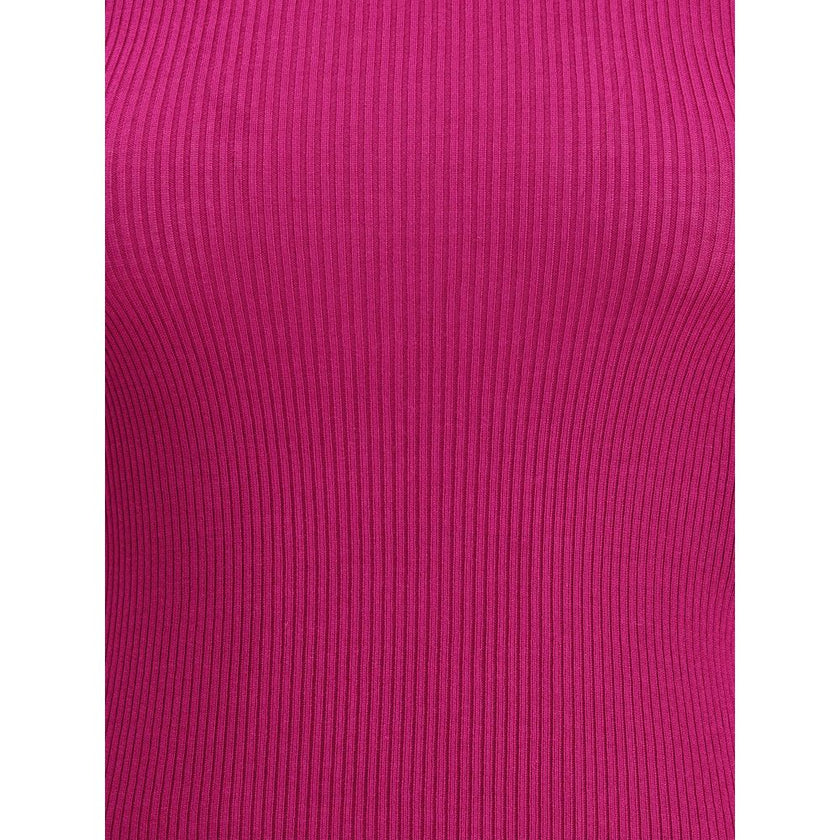 Multicolor Wool TurtleneckThe Yves Saint Laurent Turtleneck Top is an essential piece that enhances the silhouette with its slim fit. Crafted in an all-over ribbed knit, it combines certified cashmere and wool to deliver a soft feel and refined warmth. Ri