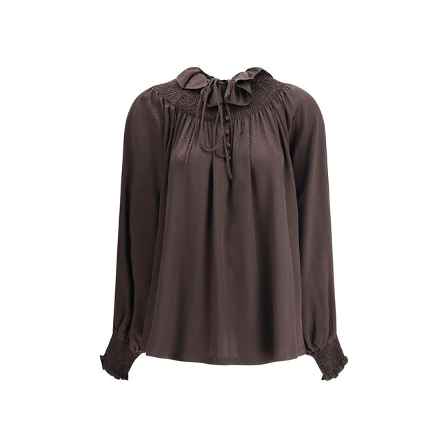 Brown Silk BlouseThe Geometric Silk Blouse by Burberry is crafted in Italy from silk crêpe de chine, jacquard-woven with a geometric pattern inspired by wallpapers found in British stately homes. Designed for a relaxed fit, it features smocking and delica