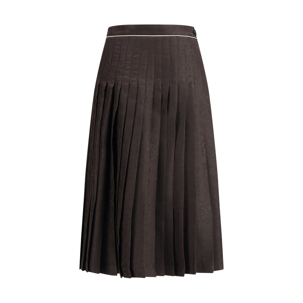 Brown Silk Midi SkirtThe Sunflower Pleated Silk Skirt by Burberry is a wrap piece that seamlessly blends heritage and modernity. Crafted from silk jacquard, it showcases William Morris’ Sunflower artwork from 1879, held at the Victoria and Albert Museum i