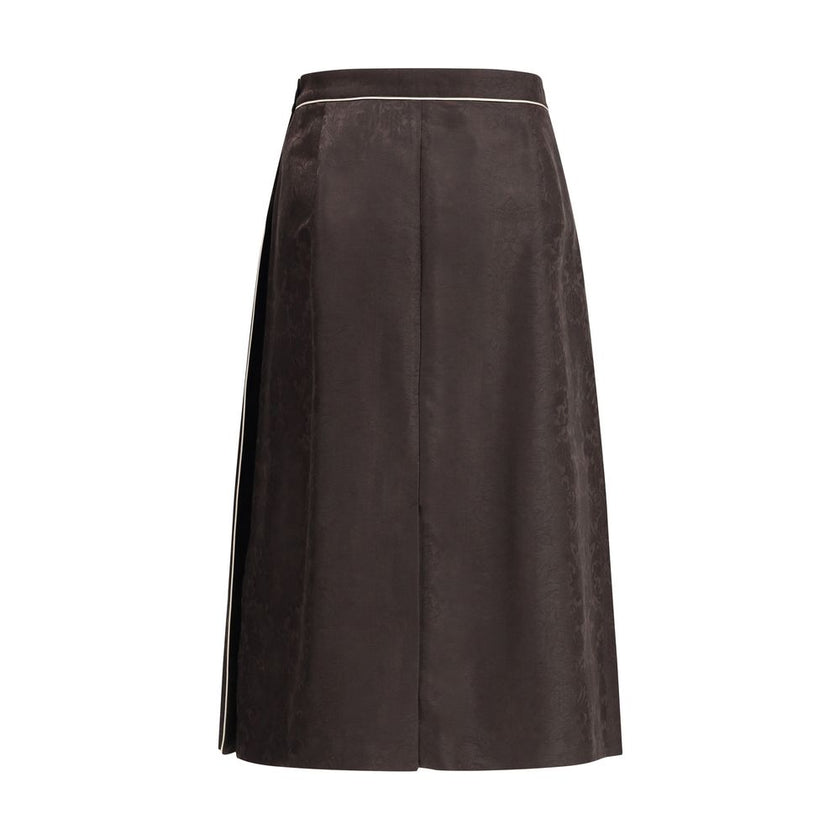 Brown Silk Midi SkirtThe Sunflower Pleated Silk Skirt by Burberry is a wrap piece that seamlessly blends heritage and modernity. Crafted from silk jacquard, it showcases William Morris’ Sunflower artwork from 1879, held at the Victoria and Albert Museum i