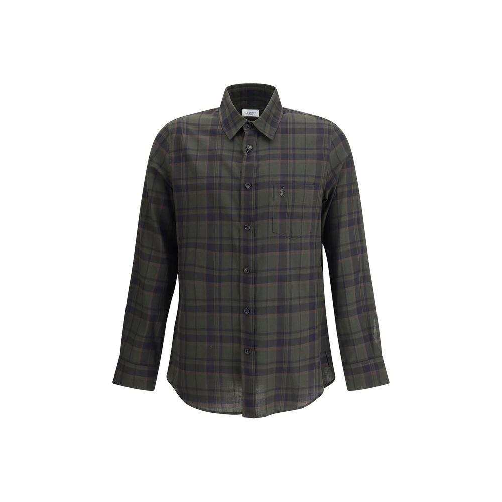Green Cotton Pattern ShirtThe checked Shirt by Saint Laurent blends timeless tailoring with a modern edge. Crafted in soft cotton, it features a pointed collar and a chest patch pocket embroidered with the iconic Cassandre logo. A front button closure, si