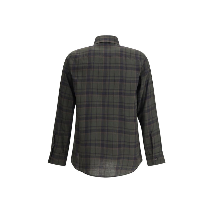 Green Cotton Pattern ShirtThe checked Shirt by Saint Laurent blends timeless tailoring with a modern edge. Crafted in soft cotton, it features a pointed collar and a chest patch pocket embroidered with the iconic Cassandre logo. A front button closure, si