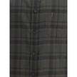 Green Cotton Pattern ShirtThe checked Shirt by Saint Laurent blends timeless tailoring with a modern edge. Crafted in soft cotton, it features a pointed collar and a chest patch pocket embroidered with the iconic Cassandre logo. A front button closure, si