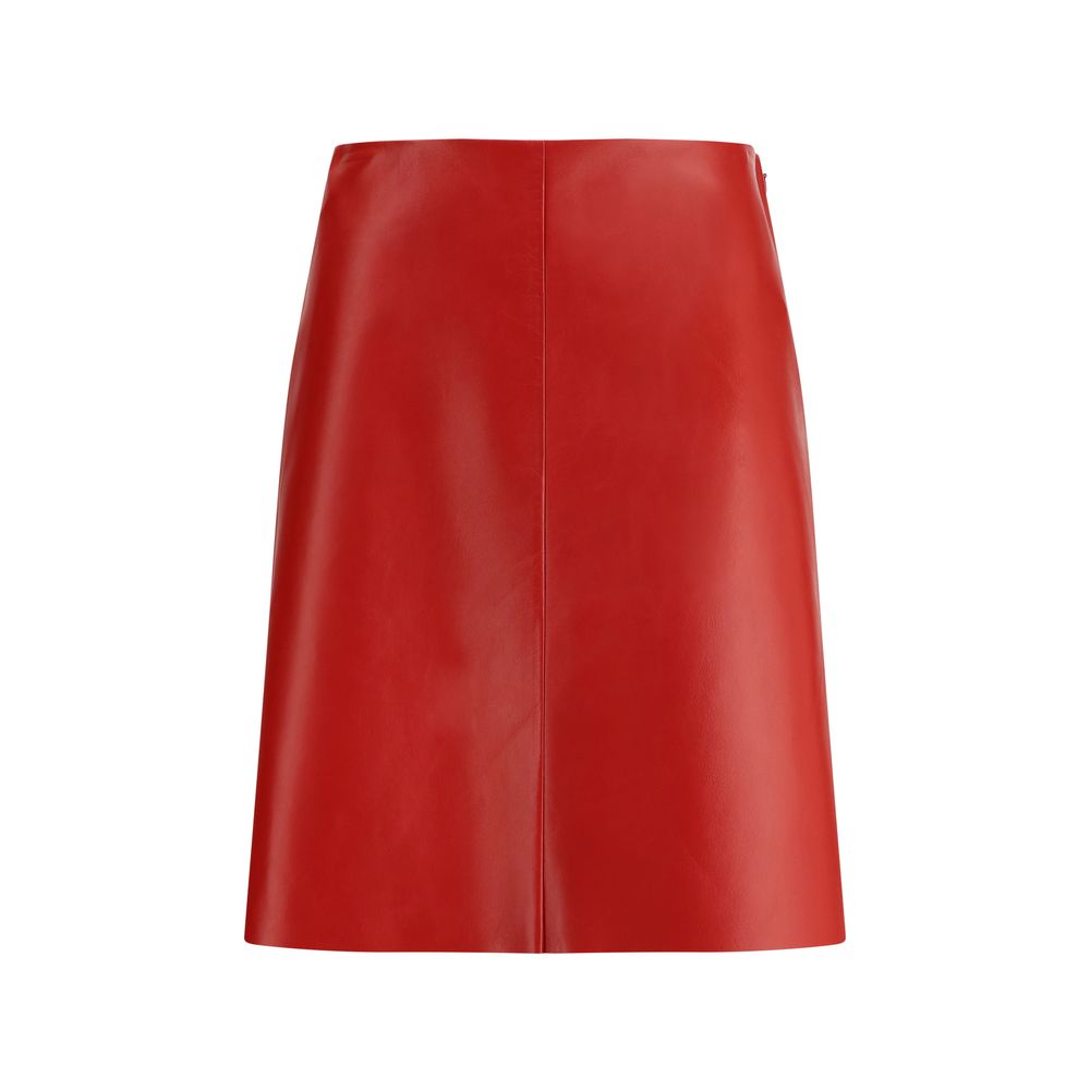 Red Lamb Leather Mini SkirtThe Nappa Leather Skirt by Miu Miu embodies sophisticated femininity with its sleek lines and lively shades. Crafted from supple nappa leather, it is enhanced by the natural sheen and softness achieved through meticulous hand-fi