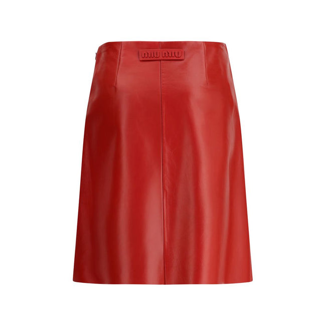 Red Lamb Leather Mini SkirtThe Nappa Leather Skirt by Miu Miu embodies sophisticated femininity with its sleek lines and lively shades. Crafted from supple nappa leather, it is enhanced by the natural sheen and softness achieved through meticulous hand-fi