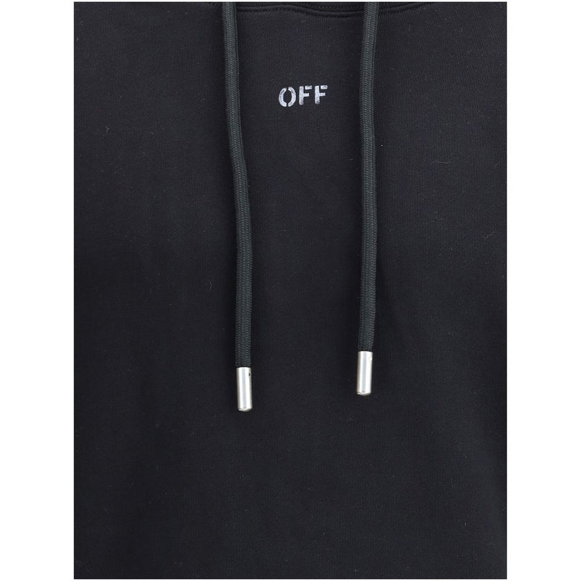 Black Cotton SweatshirtThe Stencil Arrow Skate Hoodie by Off-White embodies a bold urban aesthetic with contemporary edge. Crafted from premium cotton, it features the brand’s iconic stencil arrow graphic at the back, a hallmark of its visual language. A