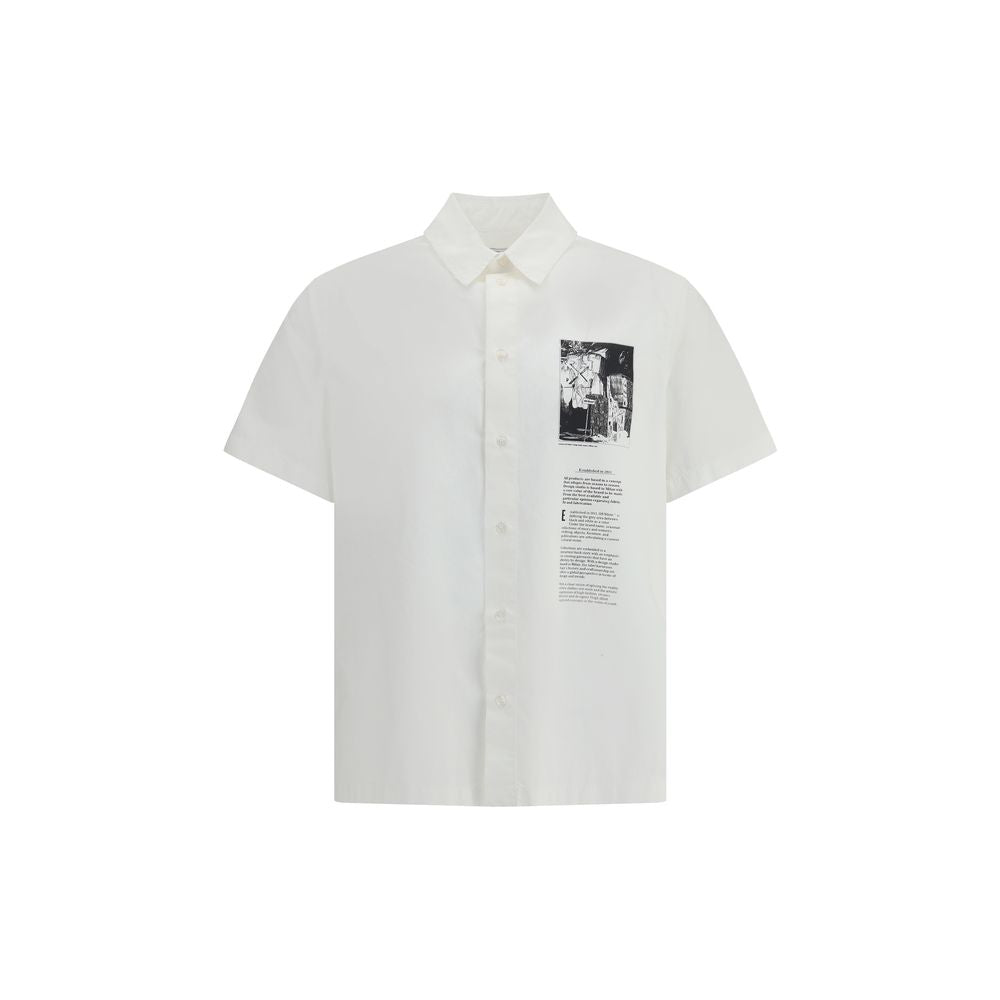 White Cotton Shortsleeve ShirtThe Off-White™ short-sleeve Cotton Shirt captures the bold, contemporary spirit of the brand. Crafted from pure cotton, it features a graphic print, a signature element that translates urban language into an instantly recogni