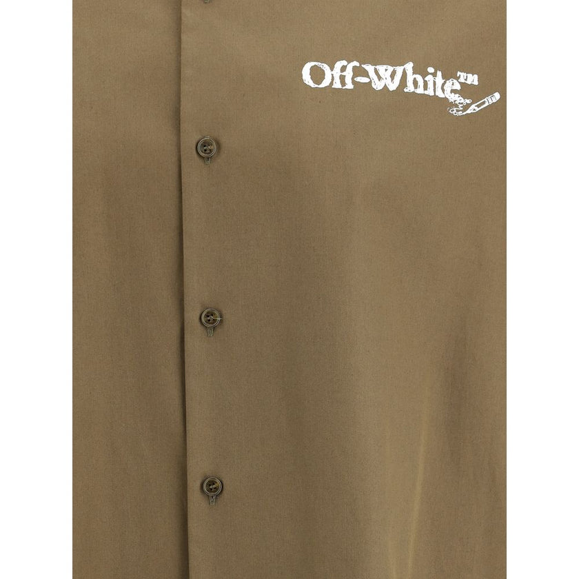 Green Cotton ShirtThe Off-White™ bowling Shirt in Poplin reimagines a menswear classic through the brand’s signature urban lens. Featuring a classic collar and front button closure, the piece is defined by the bold painted arrow print on the back, an unmi