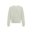 Crew-neck Sweater in merino woolThe crew-neck Sweater by Jacquemus, crafted from off-white merino wool, reflects effortless elegance. Overlock stitching beneath the neckline introduces a contemporary touch, while ribbed edges subtly define the relaxed sil