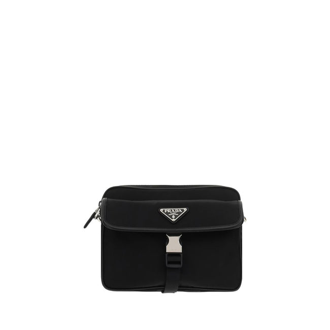 Black Polyamide Shoulder BagNylon Shoulder Bag by Prada, adjustable and removable shoulder strap with embroidered brand signature, removable mini pouch with zipper, triangular brand monogram plaque applied embossed on pouch, front push lock closure, iconi