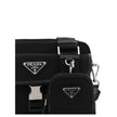 Black Polyamide Shoulder BagNylon Shoulder Bag by Prada, adjustable and removable shoulder strap with embroidered brand signature, removable mini pouch with zipper, triangular brand monogram plaque applied embossed on pouch, front push lock closure, iconi