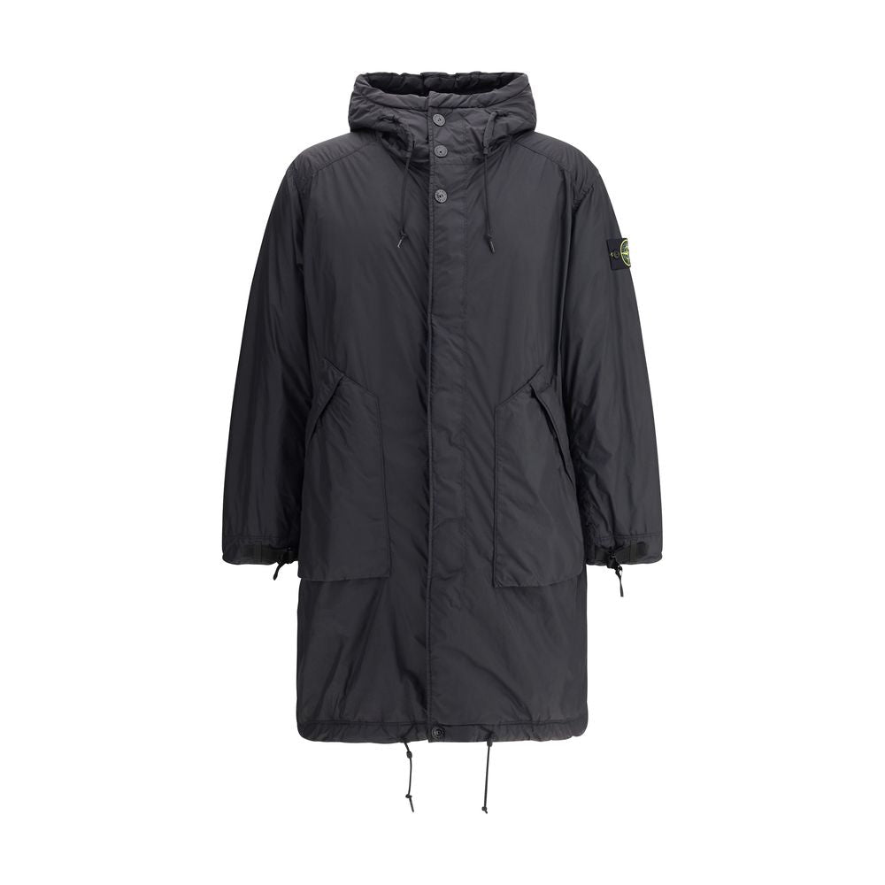 Long Down JacketStone Island’s long Down Jacket combines protection and style in a functional design. Featuring an adjustable drawstring hood and front zipper and snap-button closure, it has two maxi patch pockets on the front and an adjustable hem for a