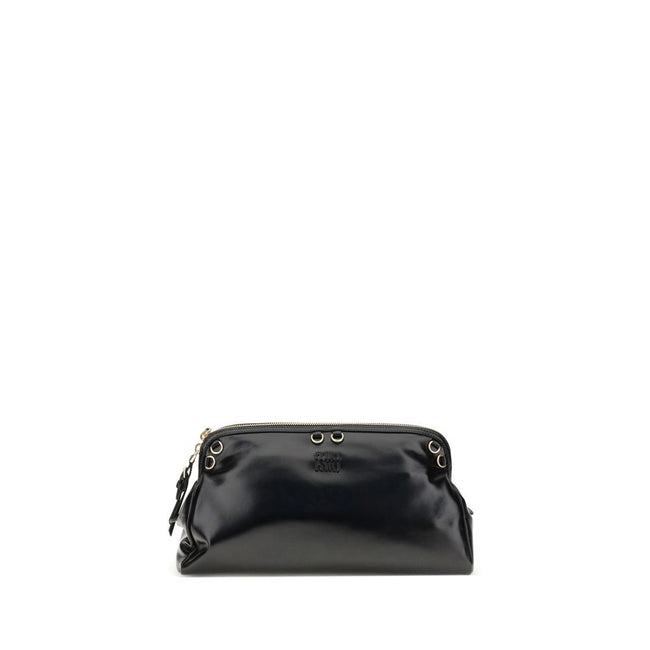 Black Calf Leather Bos Taurus Shoulder BagThe Softy Shoulder Bag by Miu Miu combines functionality and contemporary style. Featuring a double zip closure on the top, it has two adjustable and removable handles for versatile carrying. Decorative eyelets ad