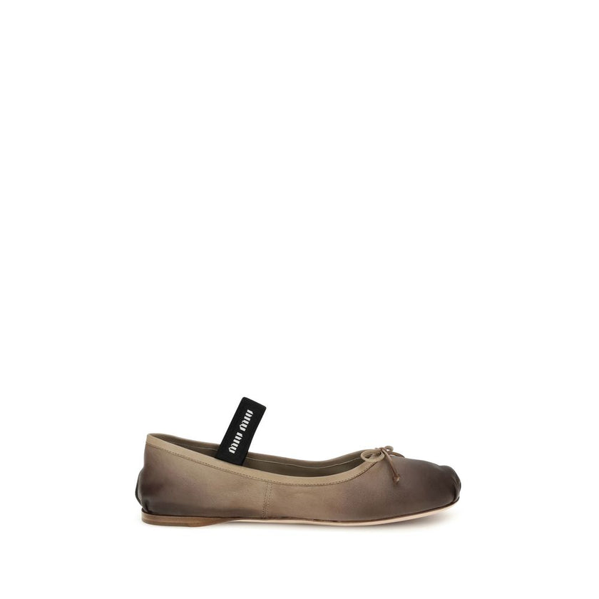 Brown Calf Leather Bos Taurus Ballet FlatsLeather Ballerinas by Miu Miu combine romantic elegance and contemporary style. The bow on the upper and the elastic waistband with knitted logo add a feminine and distinctive touch. The leather sole with rubber h