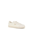 Cream Leather Low Top SneakersLeather Sneakers by Prada combine contemporary style with everyday comfort. Featuring a flat rubber sole and round toe, they are distinguished by the iconic triangular side-applied plaque and tone-on-tone logo on the back, ad