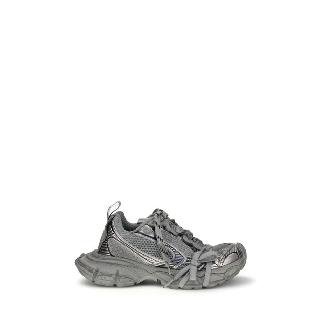 Gray Polyurethane Chunky Sneakers3XL Sneakers by Balenciaga combine futuristic aesthetics and streetwear spirit in a bold and recognizable design. Featuring a front closure with multiple laces and a double tongue, they feature an oversized construction wi