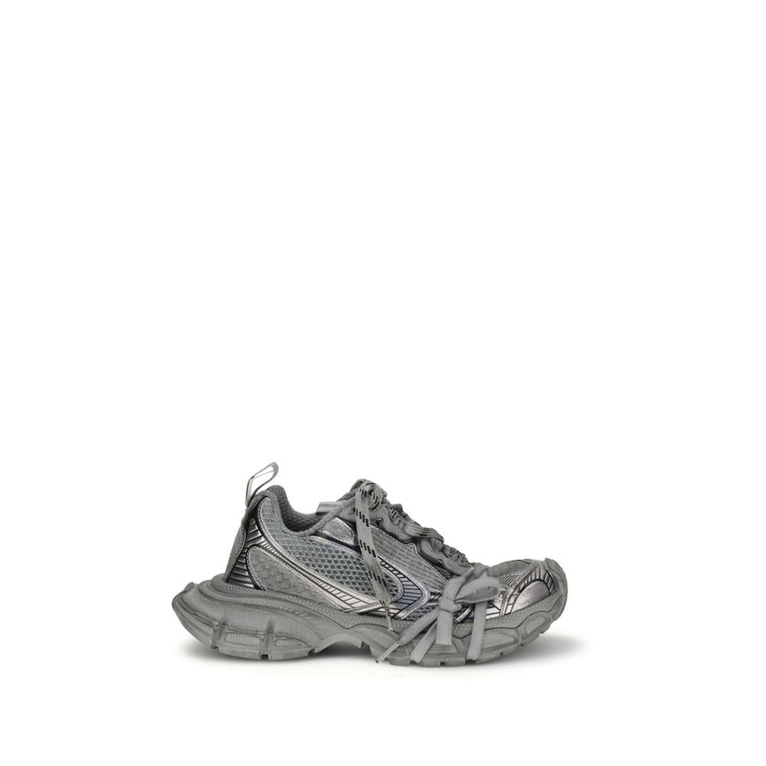 Gray Polyurethane Chunky Sneakers3XL Sneakers by Balenciaga combine futuristic aesthetics and streetwear spirit in a bold and recognizable design. Featuring a front closure with multiple laces and a double tongue, they feature an oversized construction wi