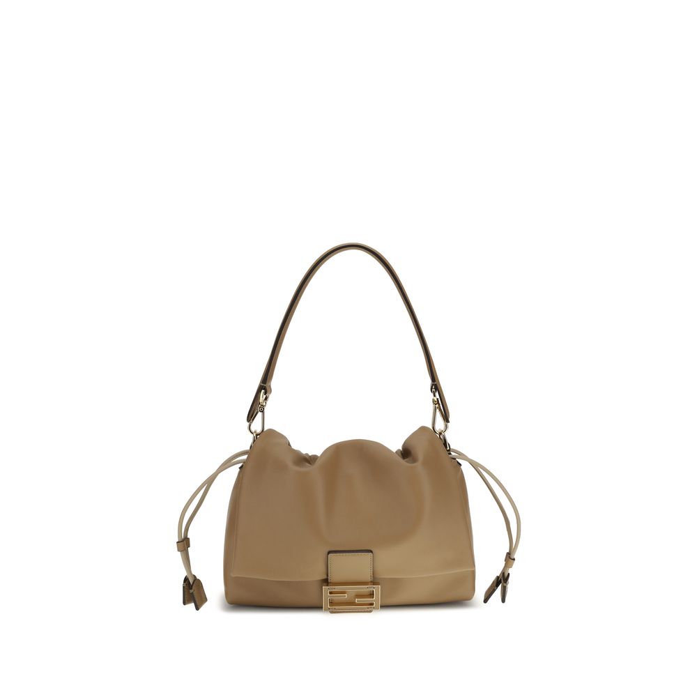 Mamma Baguette Shoulder BagMamma Baguette Shoulder Bag by Fendi is a style icon reimagined with contemporary elegance. Crafted with a decorative FF closure and tone-on-tone leather insert, it features a large suede-lined interior compartment enhanced by a