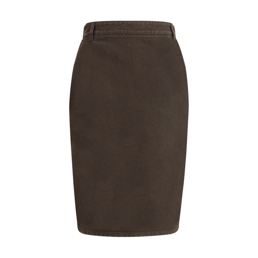 Brown Denim SkirtThe Denim Pencil Skirt by Saint Laurent combines practicality with contemporary style in an essential piece. Crafted from certified cotton, it features a mid-rise waist with belt loops, a back vent for ease of movement, and a fitted silho