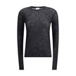 Black Cashmere Long Sleeve T-ShirtThe short-sleeved T-shirt in Cashmere and Silk by Saint Laurent is an essential piece that expresses refinement through simplicity. Featuring a classic crew neck and clean lines, it embraces the silhouette with the lightn