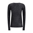 Black Cashmere Long Sleeve T-ShirtThe short-sleeved T-shirt in Cashmere and Silk by Saint Laurent is an essential piece that expresses refinement through simplicity. Featuring a classic crew neck and clean lines, it embraces the silhouette with the lightn