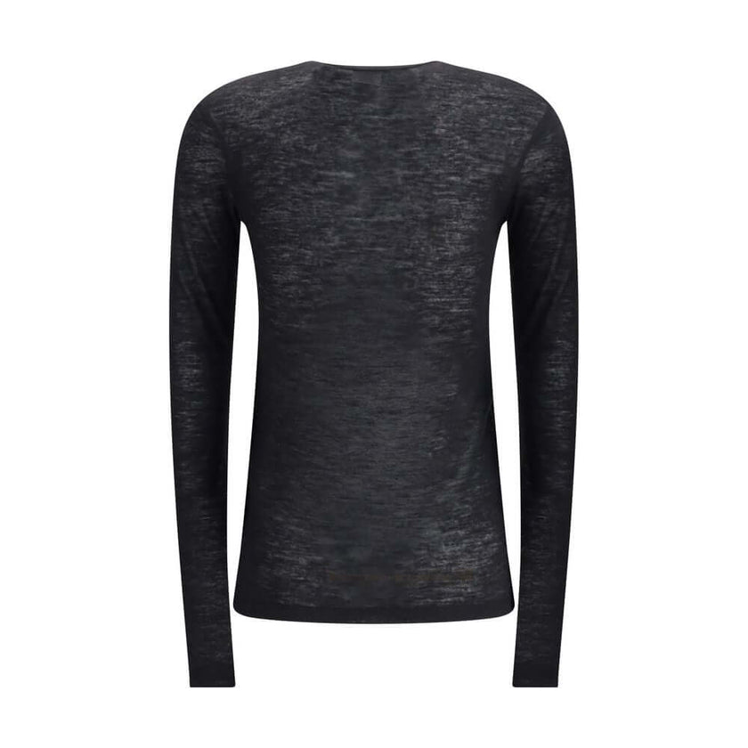 Black Cashmere Long Sleeve T-ShirtThe short-sleeved T-shirt in Cashmere and Silk by Saint Laurent is an essential piece that expresses refinement through simplicity. Featuring a classic crew neck and clean lines, it embraces the silhouette with the lightn