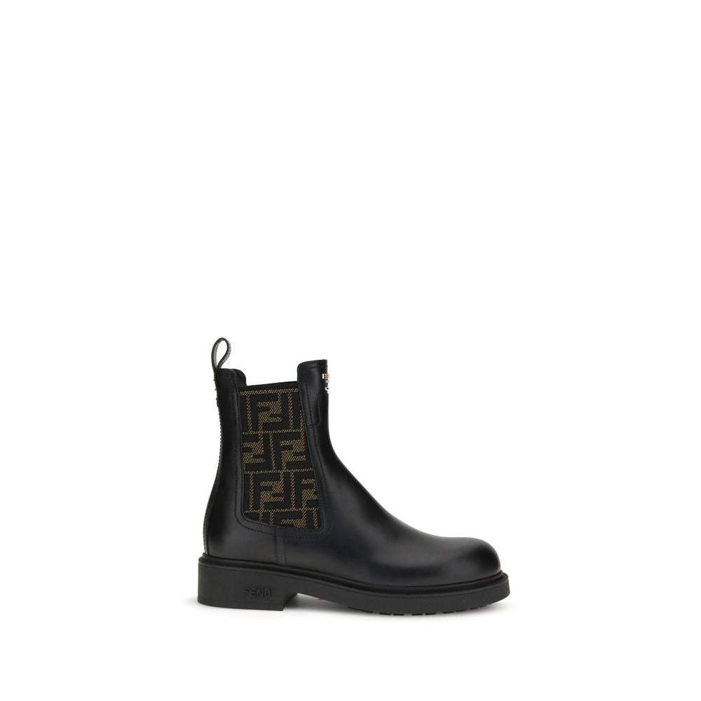 FF leather and fabric Ankle BootsFF leather and fabric Ankle Boots by Fendi combine urban style with iconic details. Made of black leather with elastic side inserts, they feature fabric details with the unmistakable FF motif. The back is embellished with