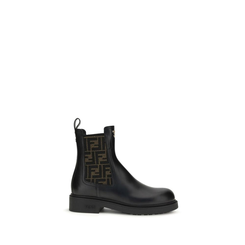 FF leather and fabric Ankle BootsFF leather and fabric Ankle Boots by Fendi combine urban style with iconic details. Made of black leather with elastic side inserts, they feature fabric details with the unmistakable FF motif. The back is embellished with