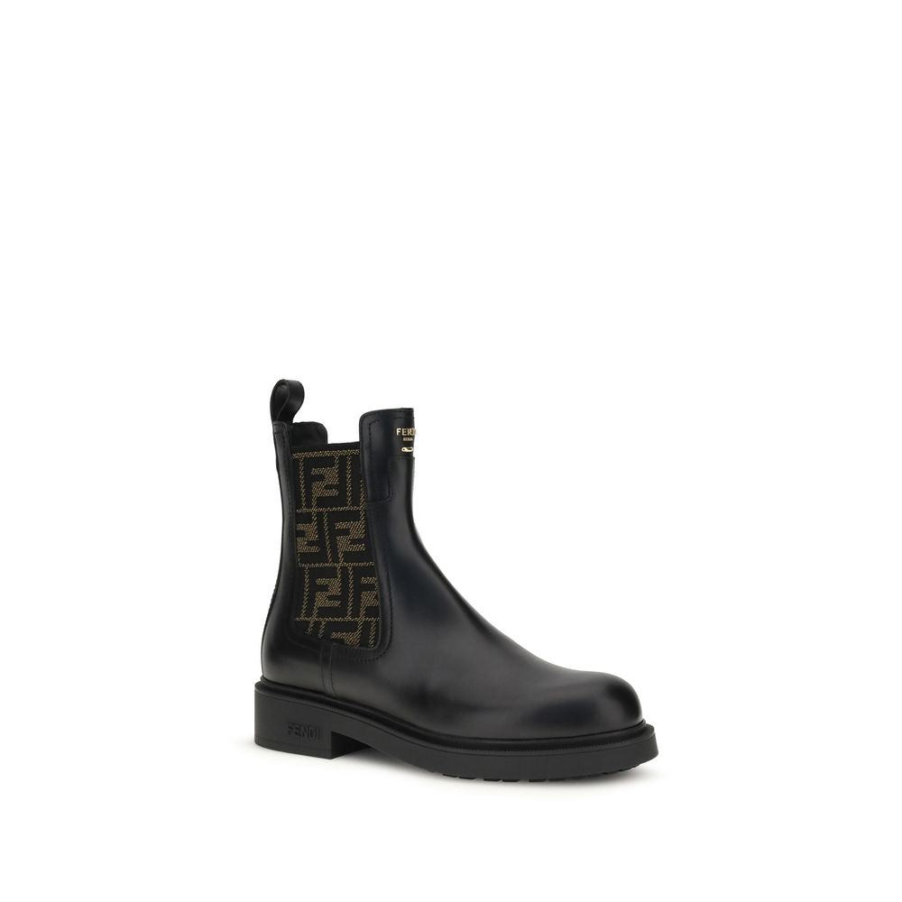 FF leather and fabric Ankle BootsFF leather and fabric Ankle Boots by Fendi combine urban style with iconic details. Made of black leather with elastic side inserts, they feature fabric details with the unmistakable FF motif. The back is embellished with