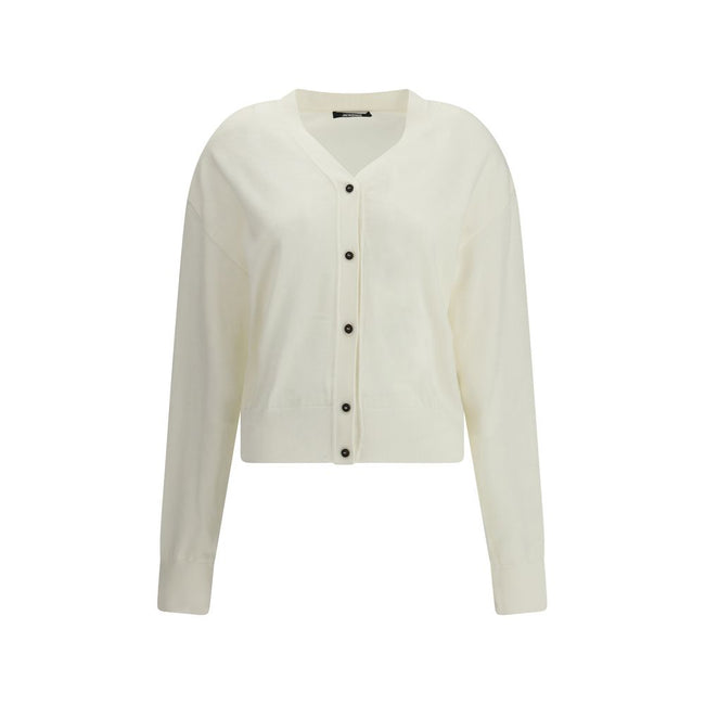 White Merino Wool CardiganMerino wool Cardigan by Jacquemus combines elegance and comfort with a V-neckline and front button closure. Finished with a ribbed hem and cuffs, it is embellished with an embroidered logo on the back for a distinctive, modern to
