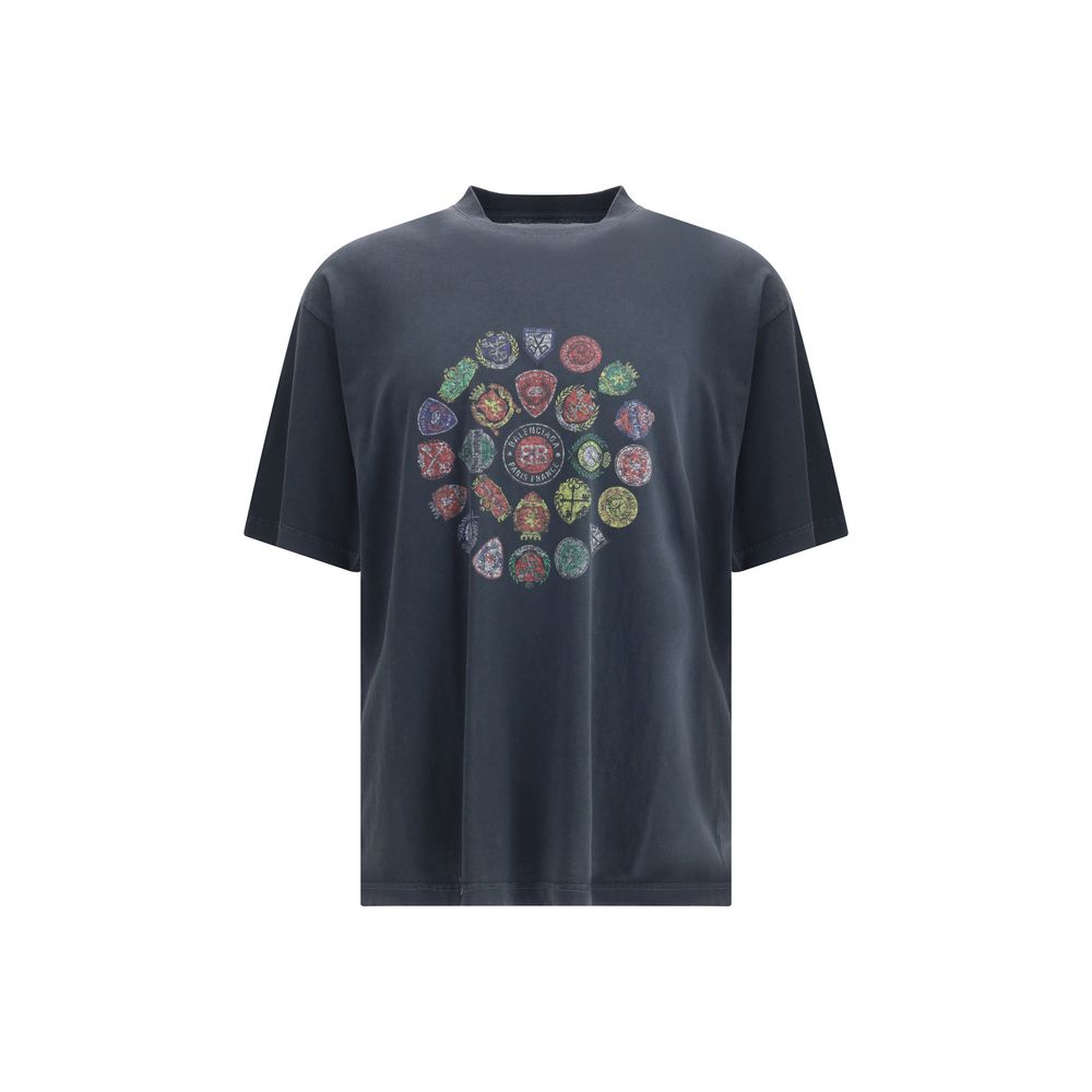 Black Cotton T-ShirtThe Cotton logo print T-shirt by Balenciaga stands out for its refined simplicity. Crafted from pure cotton, it features short sleeves, a crew neckline and a straight cut that enhances its regular fit. The graphic logo print on the fro