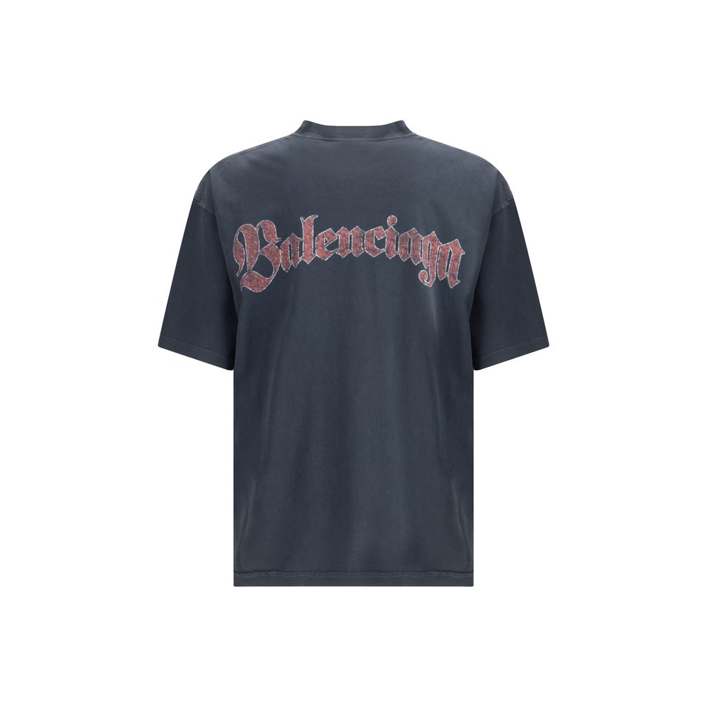 Black Cotton T-ShirtThe Cotton logo print T-shirt by Balenciaga stands out for its refined simplicity. Crafted from pure cotton, it features short sleeves, a crew neckline and a straight cut that enhances its regular fit. The graphic logo print on the fro