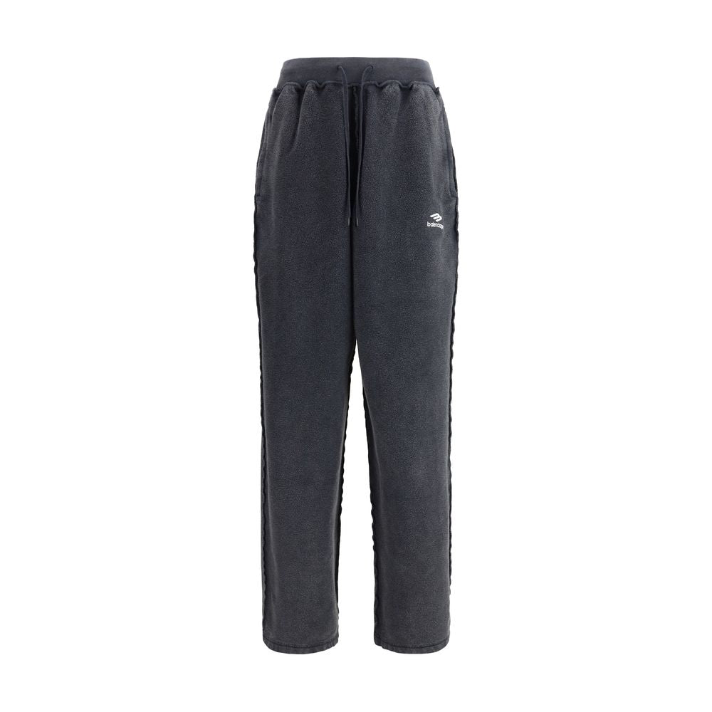 Black Cotton Joggers (Workout Pants)The Oversized Sweatpants by Balenciaga redefine the classic sportswear staple with a bold, contemporary twist. Crafted in washed-effect cotton, they feature exposed seams that create an inside-out illusion—an iconic det