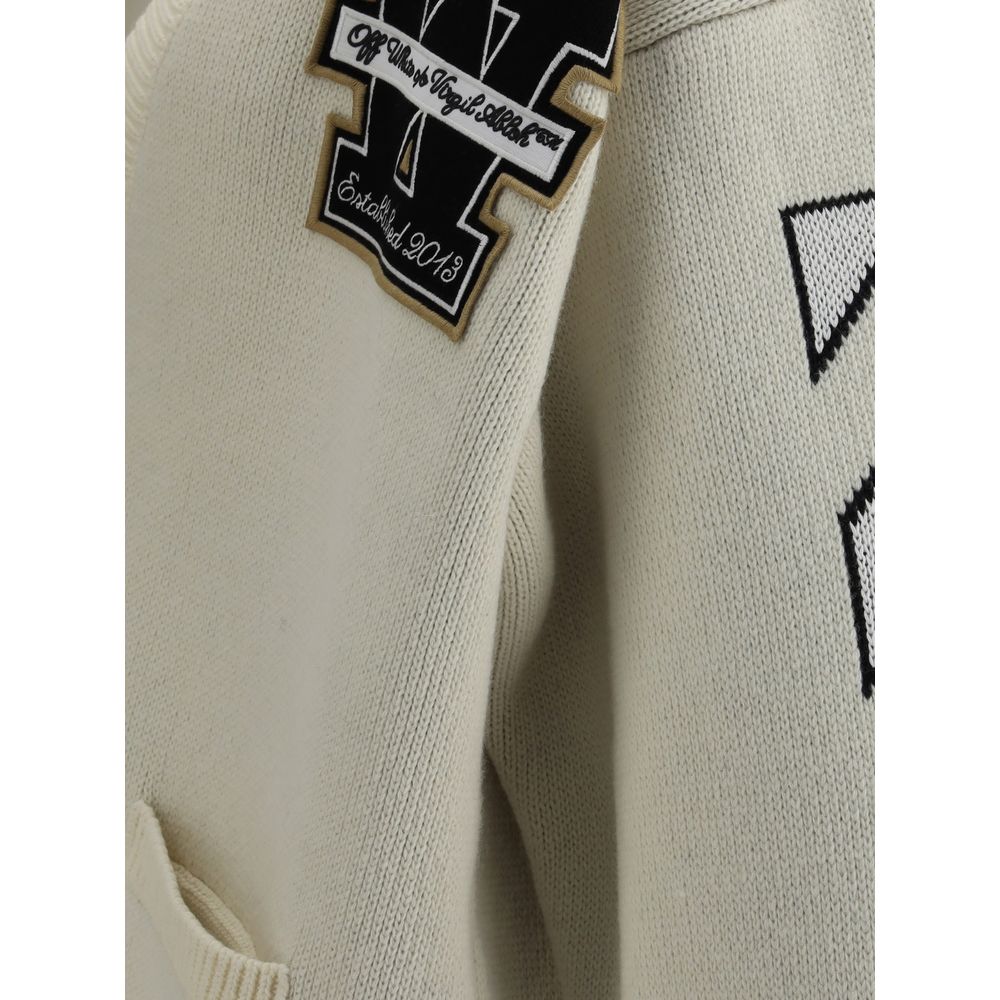 Cream Cotton CardiganThe Moon Vars Knit Cardigan by Off-White reflects the brand’s urban-inspired aesthetic with a wool construction and relaxed fit. Intarsia patterns and embroidered details bring together signature codes with the seasonal moon motif at