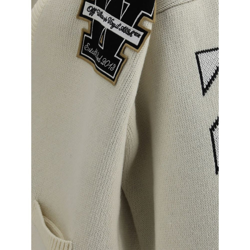 Cream Cotton CardiganThe Moon Vars Knit Cardigan by Off-White reflects the brand’s urban-inspired aesthetic with a wool construction and relaxed fit. Intarsia patterns and embroidered details bring together signature codes with the seasonal moon motif at