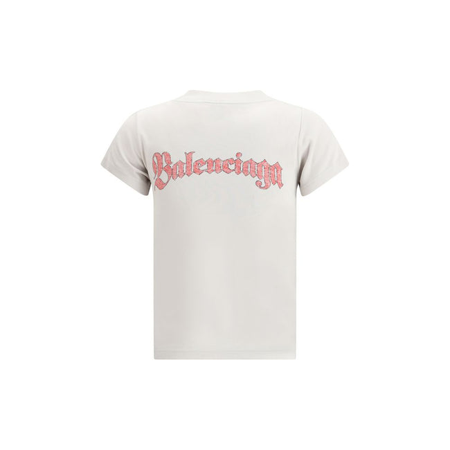 White Cotton T-ShirtThe Graphic Logo Crew Neck T-Shirt by Balenciaga embodies the minimalist and contemporary essence of the Maison. Crafted from soft cotton, it features short sleeves and a crew neckline that define its clean, versatile silhouette. The g