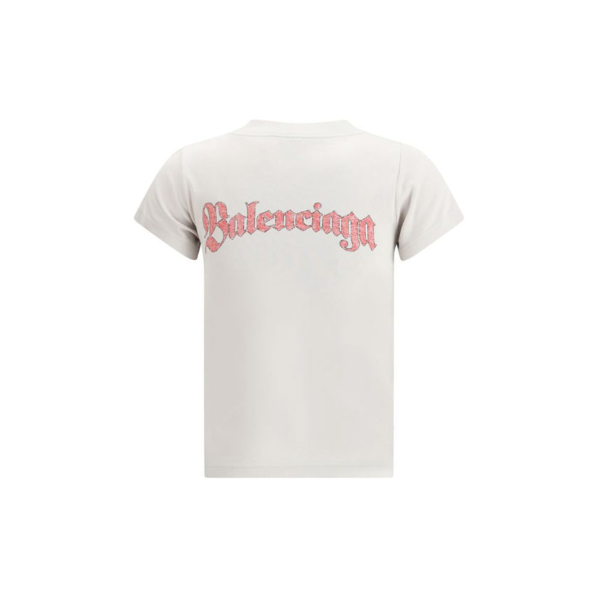 White Cotton T-ShirtThe Graphic Logo Crew Neck T-Shirt by Balenciaga embodies the minimalist and contemporary essence of the Maison. Crafted from soft cotton, it features short sleeves and a crew neckline that define its clean, versatile silhouette. The g