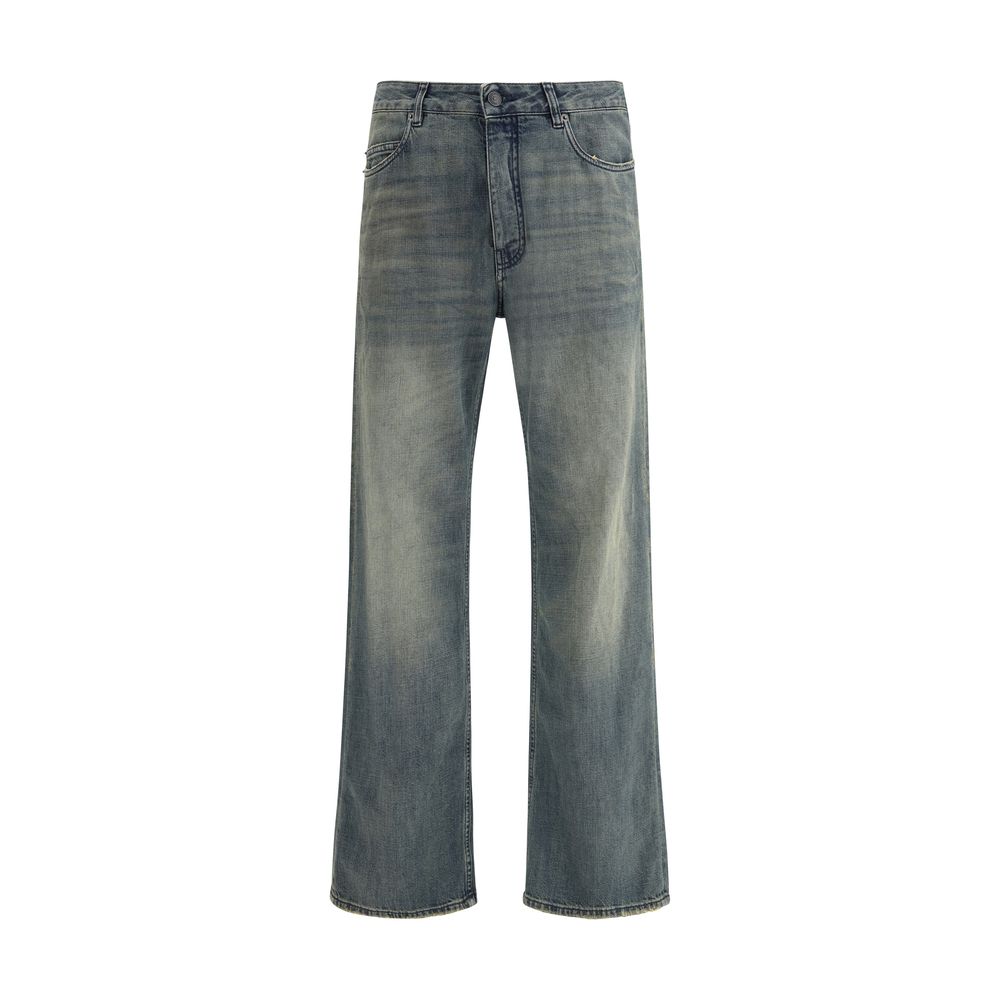 Blue Cotton Relaxed Fit JeansThe relaxed fit Cotton denim Pants feature a washed, worn-out effect that brings a laid-back yet refined appeal. Designed with a mid-rise waist, concealed zip fly, and Balenciaga-engraved button, they offer five pockets and fi